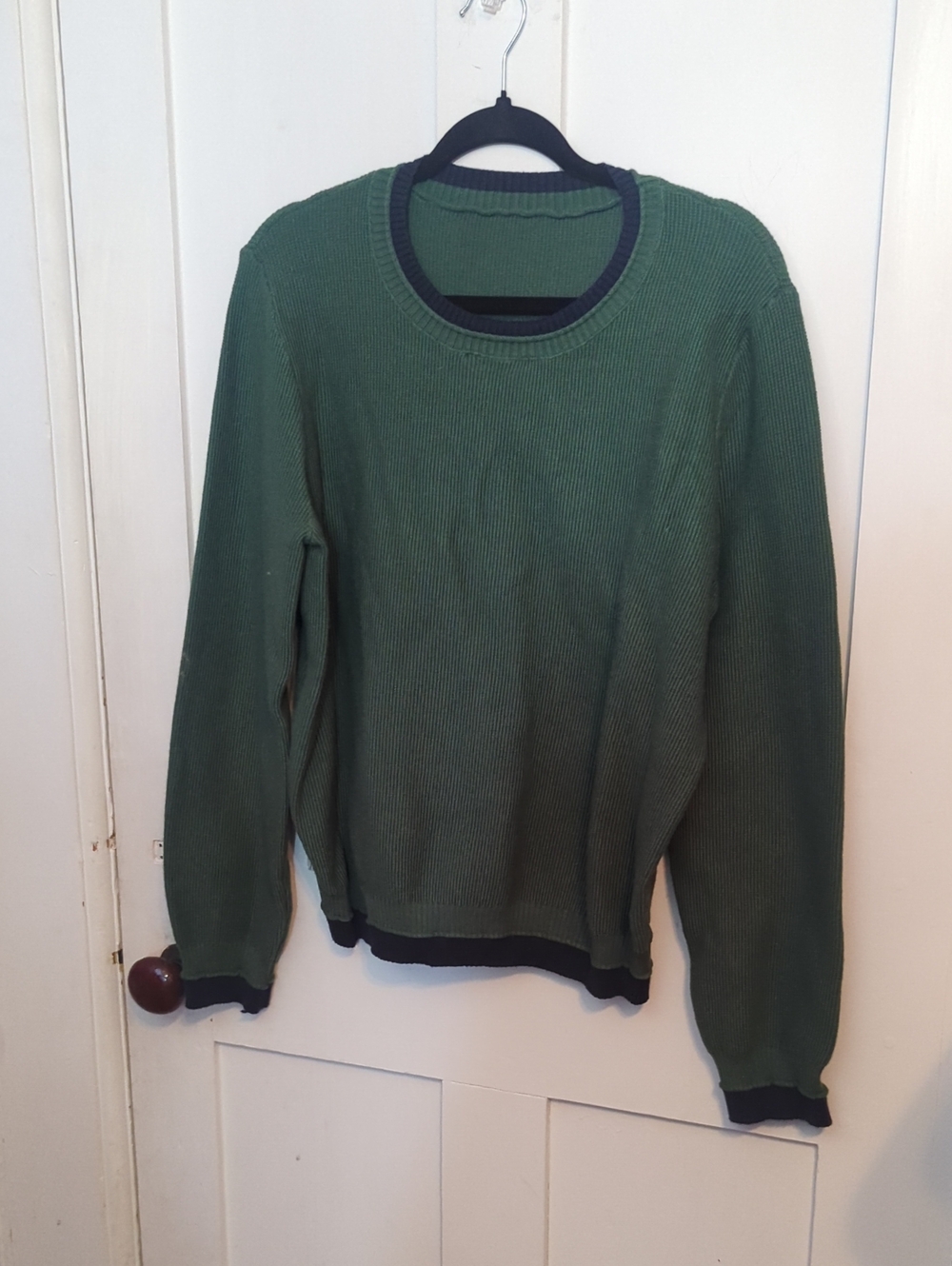Forest green scoop neck knit sweater with navy blue hems. NWOT.
